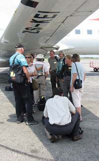 sheltering under the Convair wing in Port Gentil